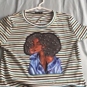 A shirt that has a girl on it